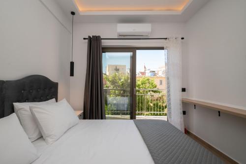 Voodi või voodid majutusasutuse Zante Center Suite A toas