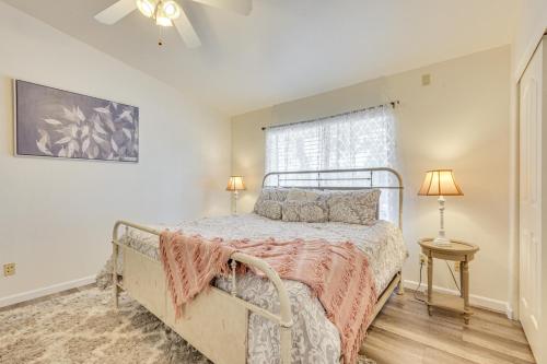 a bedroom with a bed and a window at Hike and Golf Family Home with Deck in Payson! in Payson