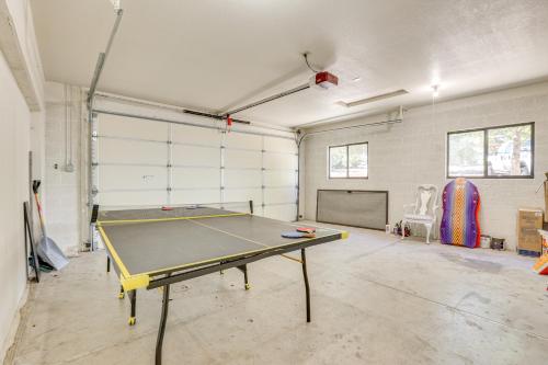 a room with a ping pong table in it at Hike and Golf Family Home with Deck in Payson! in Payson