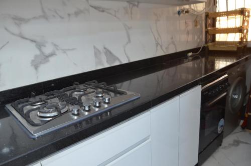 Kuchyň nebo kuchyňský kout v ubytování Appartement de standing familiale à Agadir