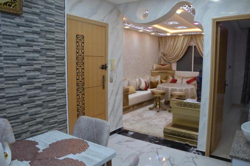 Postel nebo postele na pokoji v ubytování Appartement de standing familiale à Agadir