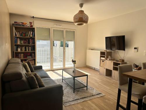 Χώρος καθιστικού στο Appartement Cosy proche Paris