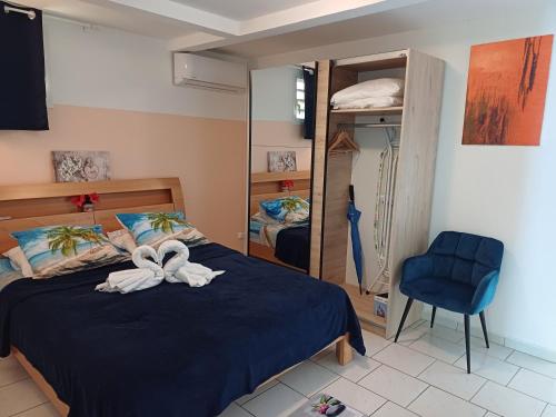 Postel nebo postele na pokoji v ubytování Le Cocon de l'Oranger