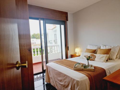 En eller flere senge i et værelse på CASA Gayuba