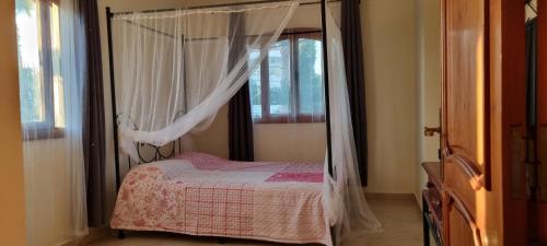 Ένα ή περισσότερα κρεβάτια σε δωμάτιο στο Beautiful Family Villa with private swimming pool