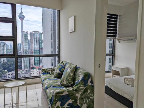 Un ou plusieurs lits dans un hébergement de l'établissement The Robertson Bukit Bintang by WEEGO Homes