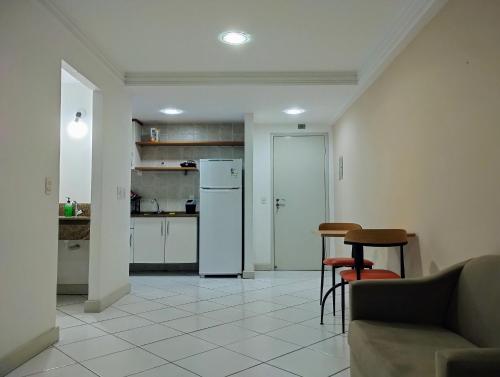 Η κουζίνα ή μικρή κουζίνα στο Terra Hospedagem flats aconchegantes piscina e academia via park