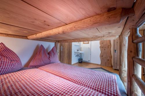 Postel nebo postele na pokoji v ubytování Berggasthof Biberg