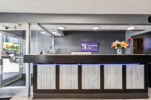 a bar in the lobby of a building at Knights Inn Antioch in Antioch