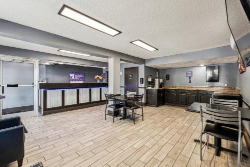 a large room with chairs and a table in it at Knights Inn Antioch in Antioch