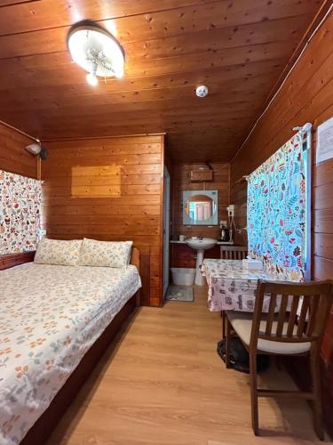 Postel nebo postele na pokoji v ubytování Shitaoyuan