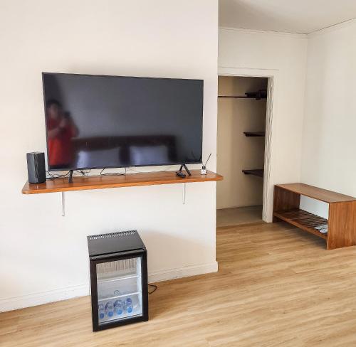 a flat screen tv on a wall in a room at J Park Pakchong in Ban Sao Thong