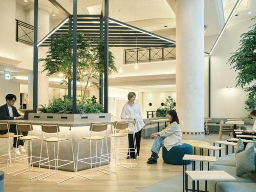 a rendering of a lobby with people sitting around tables and chairs at Prince Smart Inn Nagoya Sakae in Nagoya
