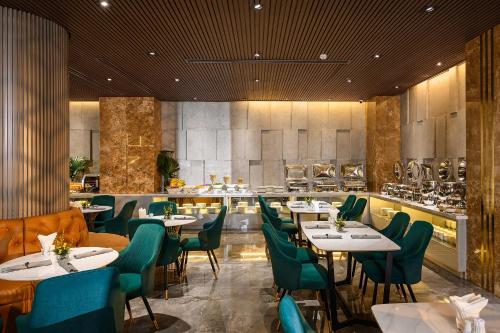 Restaurace v ubytování Acnos Hotel