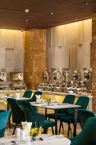 Restaurace v ubytování Acnos Hotel