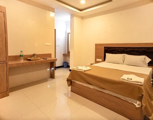 Postel nebo postele na pokoji v ubytování Hotel Sea Land