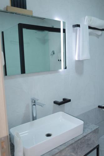 Koupelna v ubytování Bentark Hotel