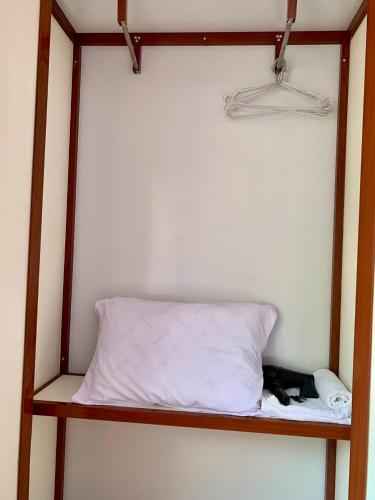 Postel nebo postele na pokoji v ubytování Nhà Nghỉ Hương Nguyên
