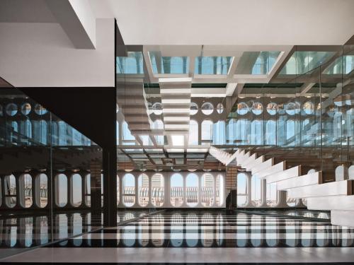 a view of a building with windows and ceilings at ISEYA Panoramic Hotel Chongqing Jiefangbei Raffles Plaza in Chongqing