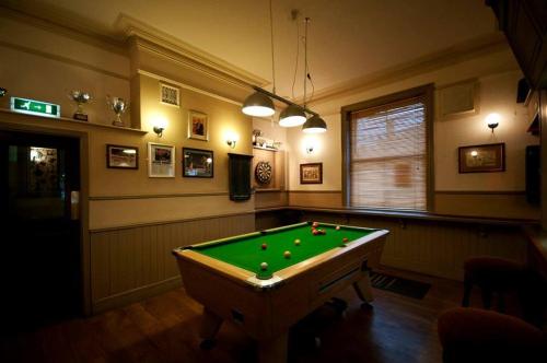 a billiard room with a pool table in it at Locomotion in Eaglescliffe