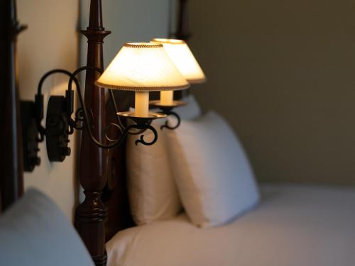Postel nebo postele na pokoji v ubytování Hotel Nikko Alivila