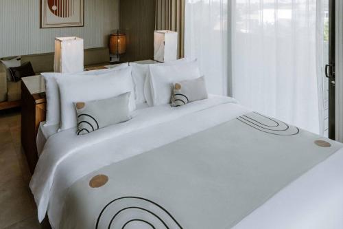 The Komu Canggu Baliにあるベッド