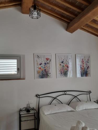 Postel nebo postele na pokoji v ubytování Il Sogno di Andrea