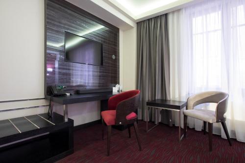 Old Town Hotelにあるテレビまたはエンターテインメントセンター