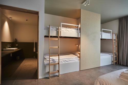 Postel nebo postele na pokoji v ubytování Vakantiewoning Het Kasterhuis
