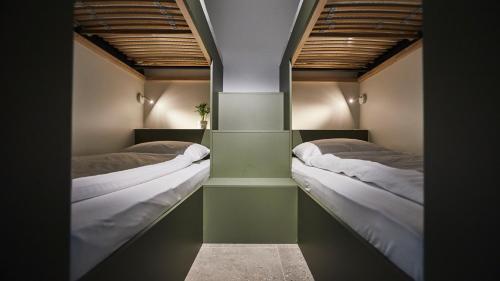 Ein Bett oder Betten in einem Zimmer der Unterkunft Vakantiewoning Het Kasterhuis