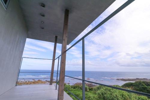 a room with a view of the ocean at CHLOROBIANCO amami in Amami