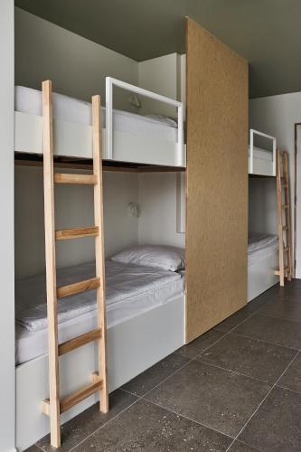 Ein Bett oder Betten in einem Zimmer der Unterkunft Vakantiewoning Het Kasterhuis