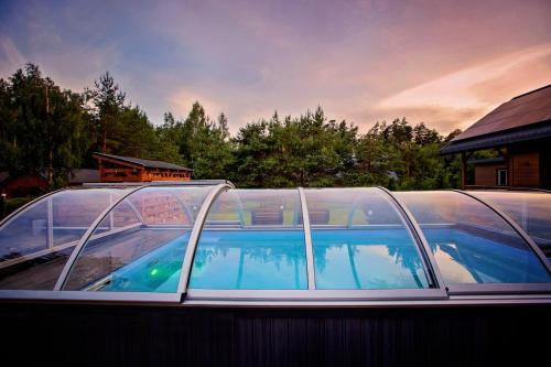 a close up of a swimming pool on a boat at Winiec Family Houses in Winiec