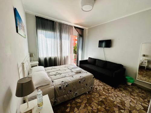 Televízia a/alebo spoločenská miestnosť v ubytovaní City Rooms