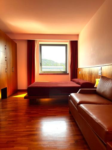 Postel nebo postele na pokoji v ubytování don guglielmo panoramic hotel & spa
