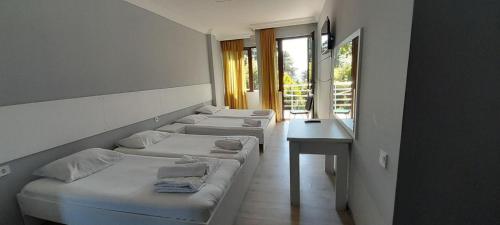 Postel nebo postele na pokoji v ubytování Hotel 288a