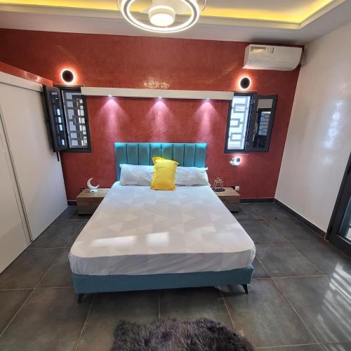 Una cama o camas en una habitación de Burj chambre