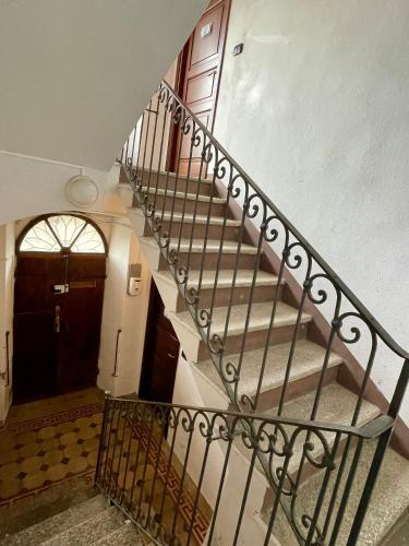 a staircase leading to a door in a building at I Tre Fratelli in Vignone