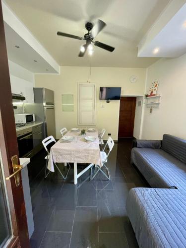 a living room with a table and a couch at I Tre Fratelli in Vignone