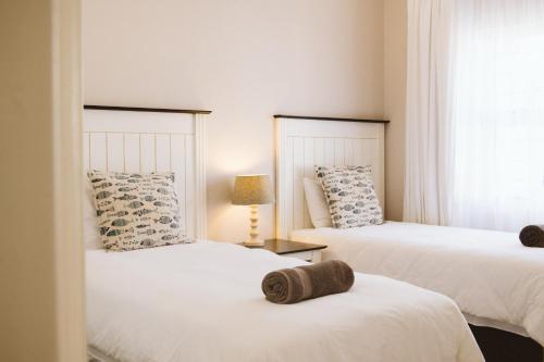 Ένα ή περισσότερα κρεβάτια σε δωμάτιο στο Stone Ridge Luxury Self Catering Unit