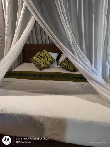 Ένα ή περισσότερα κρεβάτια σε δωμάτιο στο Bungalow Soka
