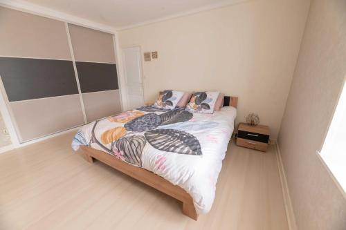 Cama o camas de una habitación en Chez Laurence