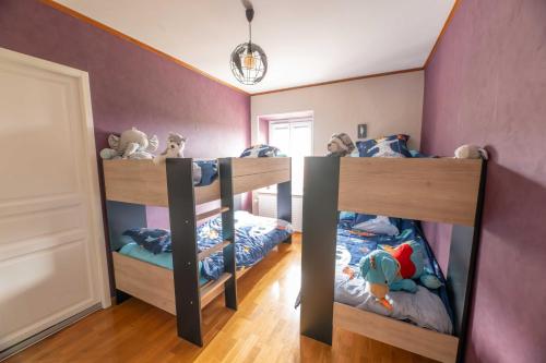 Cama o camas de una habitación en Chez Laurence