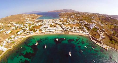an aerial view of a harbor with boats in the water at Pleiades Modern Villa with Shared Pool in Ornos in Ornos