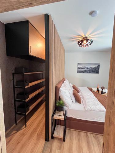 Ένα ή περισσότερα κρεβάτια σε δωμάτιο στο Apartmán Herlíkovice 303