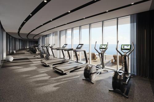 a gym with a row of treadmills at Del Mar 2 Bedroom Deluxe Seaside 'A' Residence in Limassol