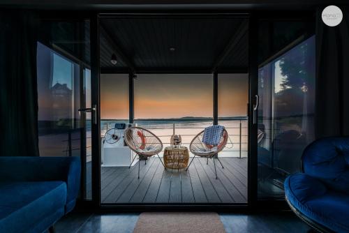 Φωτογραφία από το άλμπουμ του Domek na wodzie - HAUSBOOT - Domek pływający -CHARZYKOWY σε Charzykowy