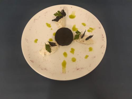 a plate of food with chocolate on it at Hotel Oberdan Ristorante Pizzeria in Concordia Sagittaria