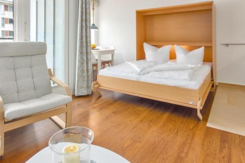 Llit o llits en una habitació de Strandlust