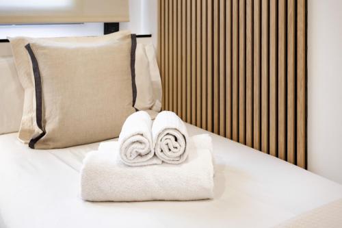 เตียงในห้องที่ Cozy Apartment II - Les Corts